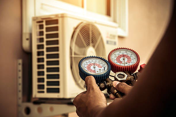 Professional Hvac Maintenance technician working in Harriman, TN